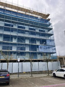 Central Milton Keynes office to apartments conversion and merlin scaffolding van